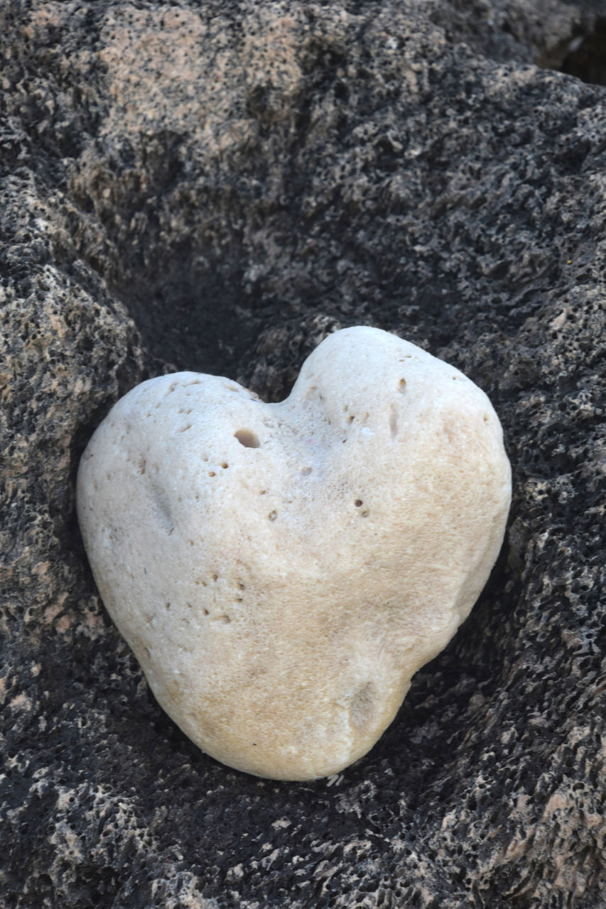 heart shape, love, positive emotion, emotion, no people, valentine's day, high angle view, rock, heart, close-up, food, nature, food and drink, land, day, single object, still life, textured, outdoors, shape, creativity, directly above