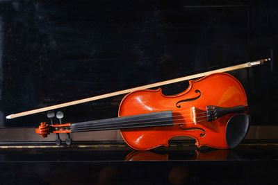 Close-up of violin on table