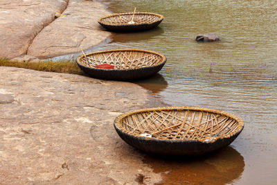 Wickerwork coracle boat in hampi, karnataka, india