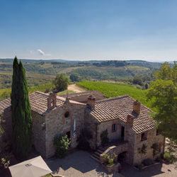 High angle view of houses and trees against sky