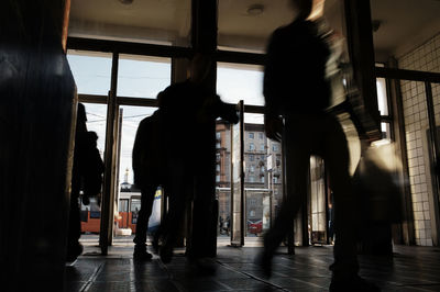 Blurred motion of people walking at subway station lobby