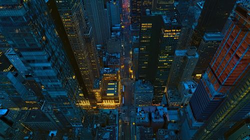 Illuminated buildings in city at night