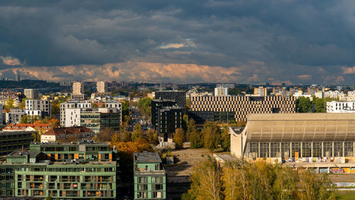 High angle view of buildings in city against sky