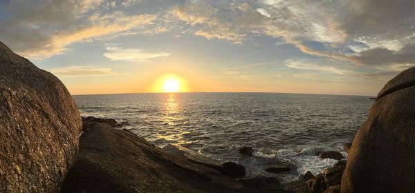 Scenic view of sea against sky during sunset