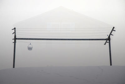 Scenic view of lake against sky during winter