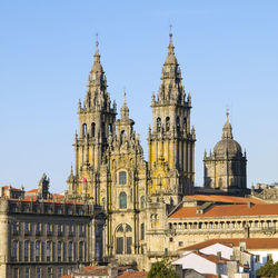 Low angle view of buildings against clear sky