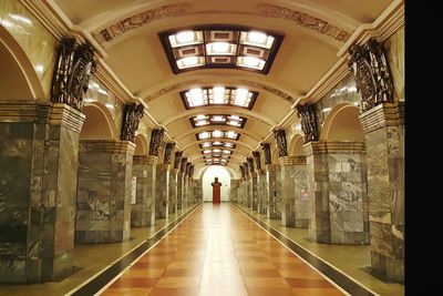 Rear view of man in corridor