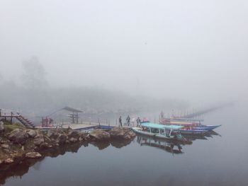 Scenic view of sea against sky during foggy weather