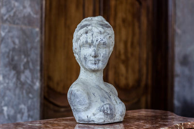 Close-up of statue on table