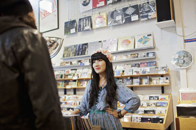 People talking in a record store