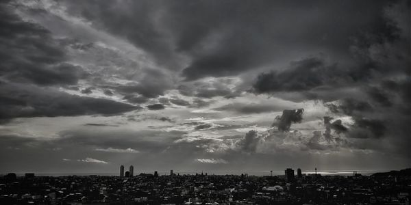 Panoramic view of cityscape against sky