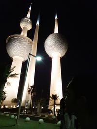 Low angle view of illuminated street light at night
