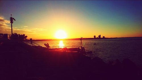 Scenic view of sea at sunset