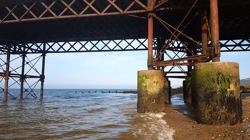 View of bridge over sea against sky