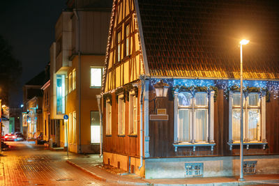 Illuminated street at night