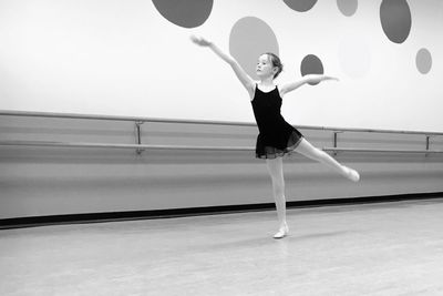 Portrait of woman standing with umbrella