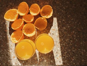 Close-up of orange juices on table