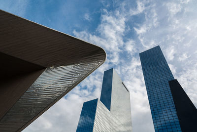 Low angle view of modern buildings against sky