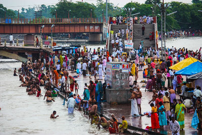 High angle view of people on boats in river