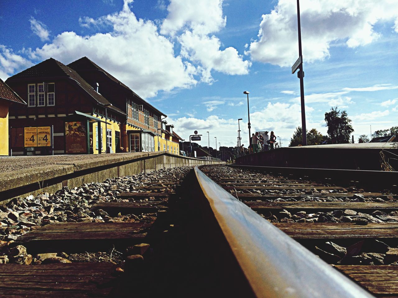 architecture, built structure, sky, building exterior, city, transportation, bridge - man made structure, cloud - sky, connection, river, mode of transport, water, cloud, travel destinations, outdoors, harbor, travel, waterfront, engineering, no people