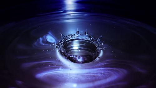 Close-up of drop splashing in water