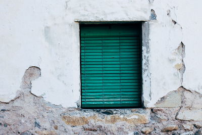 Closed window of old building