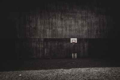 Basketball hoop against wall