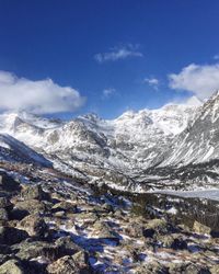 Scenic view of snowcapped mountains against sky