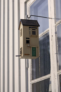 Advanced birdhouse hanging outside windows