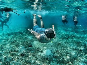 Portrait of man snorkeling in sea