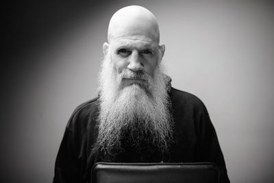 Portrait of man against white background