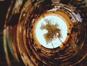 Close-up of old rusty glass