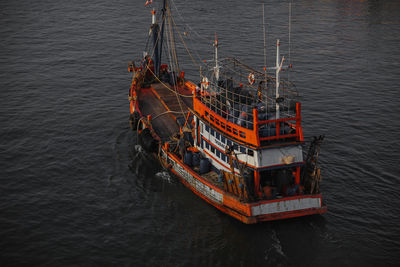 High angle view of ship sailing on sea