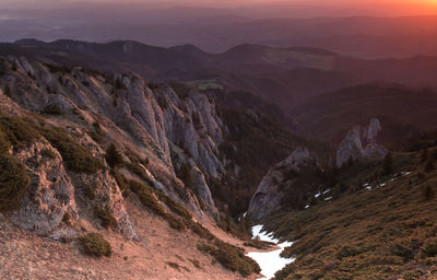 Scenic view of mountains against sky during sunset