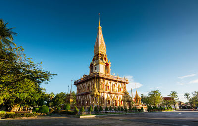 View of temple against clear blue sky