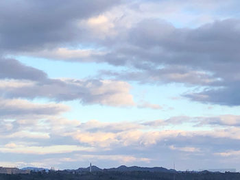 Low angle view of silhouette mountain against sky