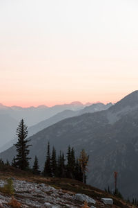 Scenic view of mountains against sky during sunset