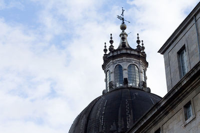 Low angle view of statue against sky