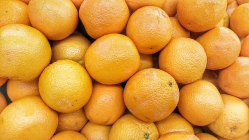 Full frame shot of oranges in market