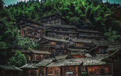 Buildings with trees in background