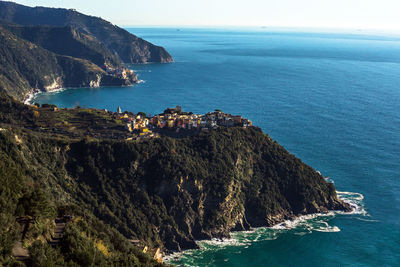 Aerial view of corniglia on the mediterranean sea cliffs in cinque terre national park, la spezia