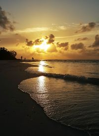 Scenic view of sea at sunset