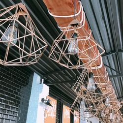 Low angle view of ferris wheel in building