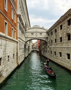 View of canal along buildings