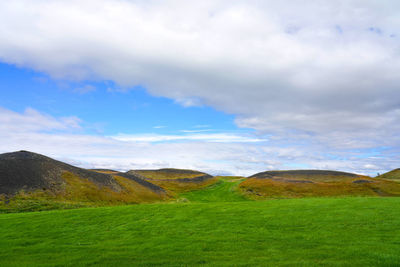 Scenic view of field against sky