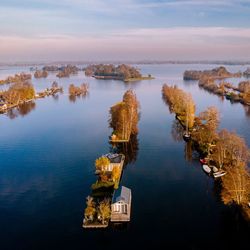 Panoramic view of lake against sky during sunset