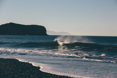 Scenic view of sea against clear sky