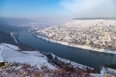 High angle view of cityscape against sky during winter