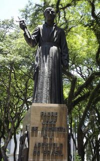 Statue of man in park