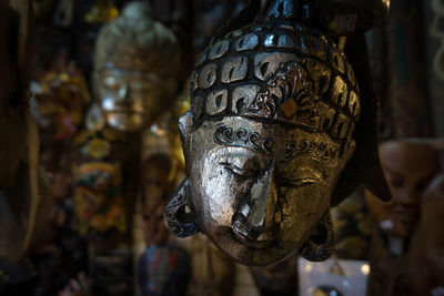 Close-up of buddha statue at store for sale